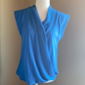 Blue sleeveless wrap blouse